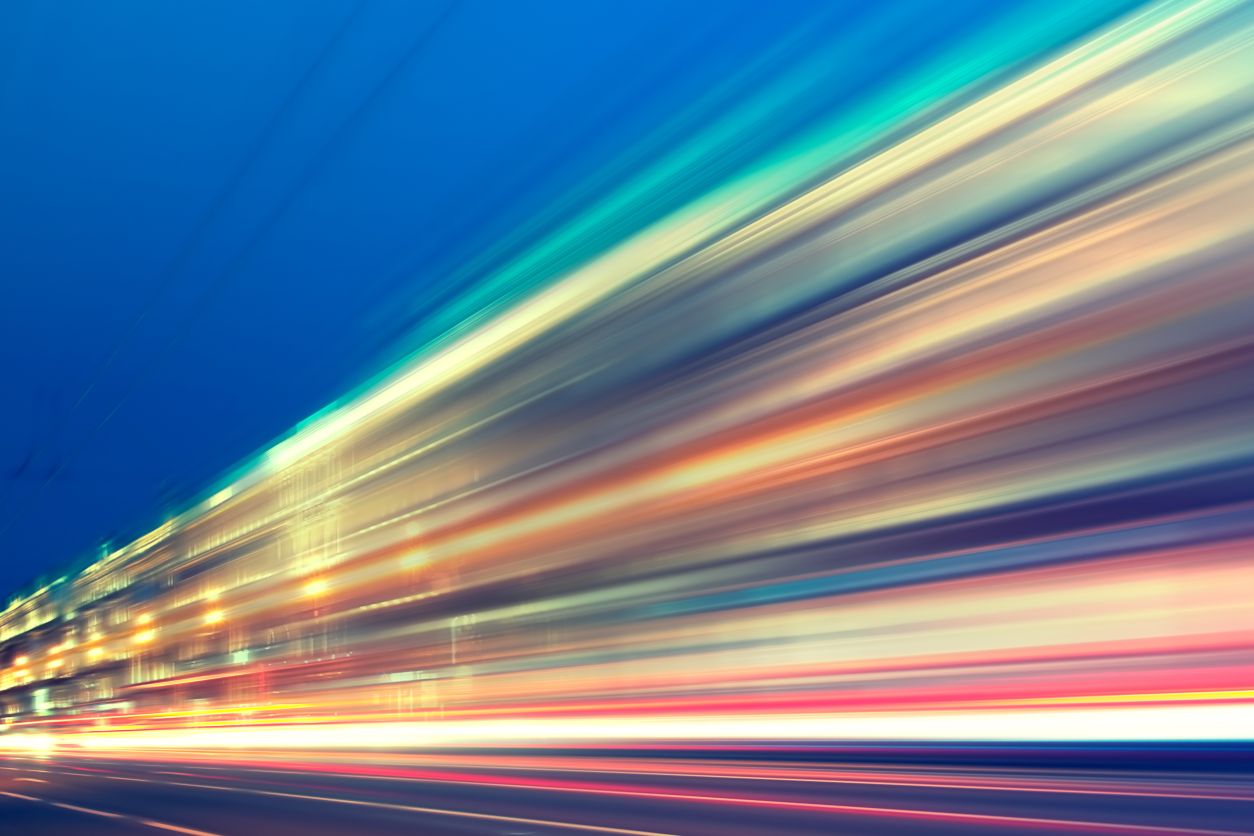 Abstract image of blur motion of cars on the city road at night