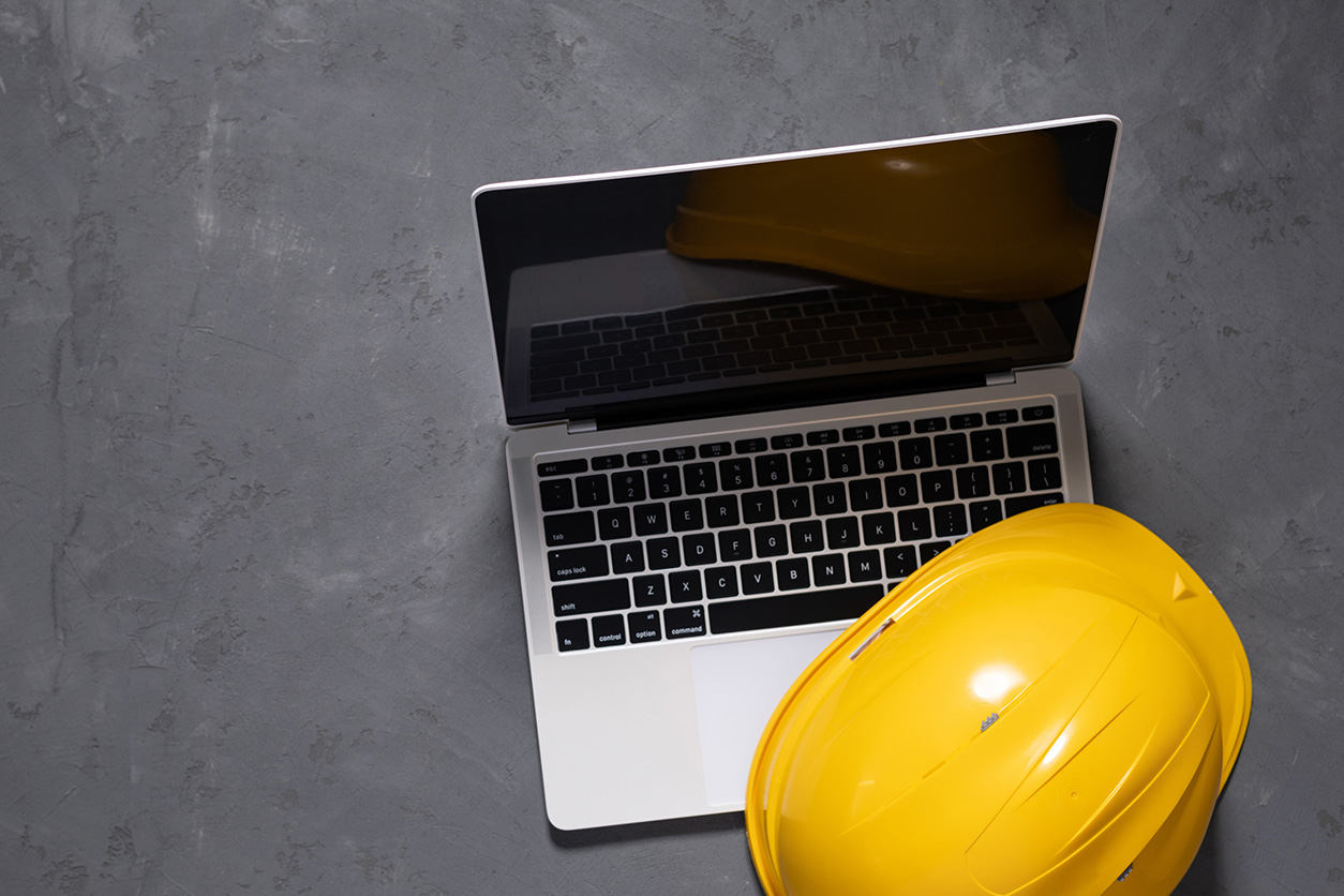laptop and hard hat