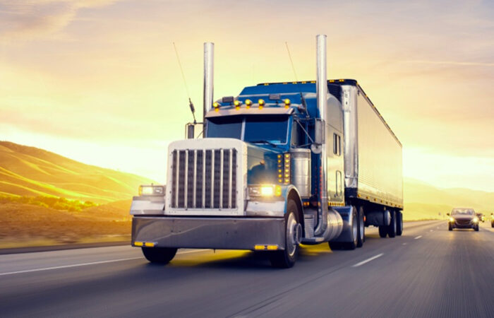 truck driving down a highway