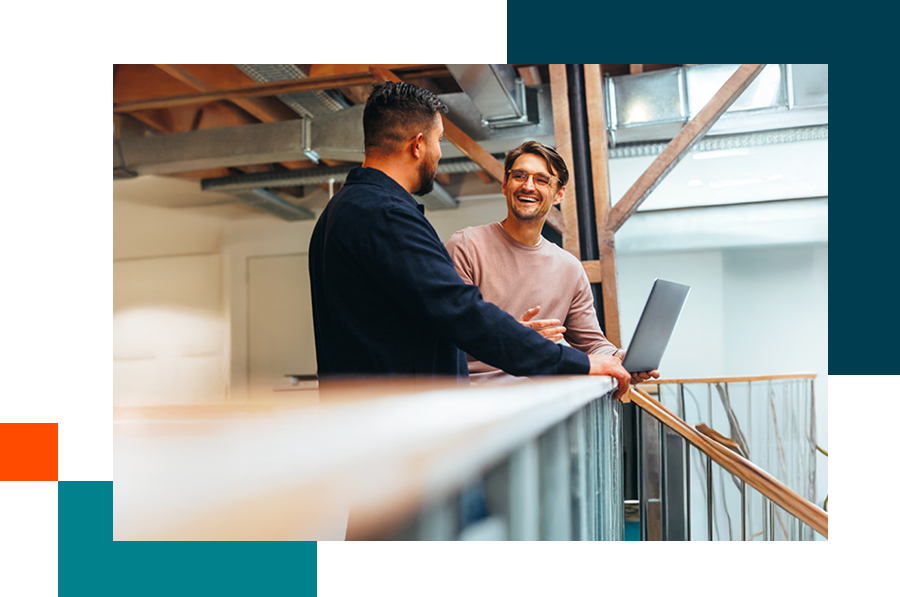 two people discussing the role of tech in their business
