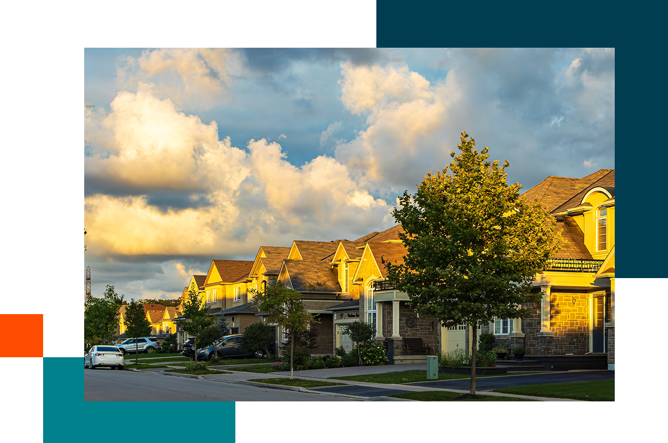 Suburban street with lots of clouds in the sky