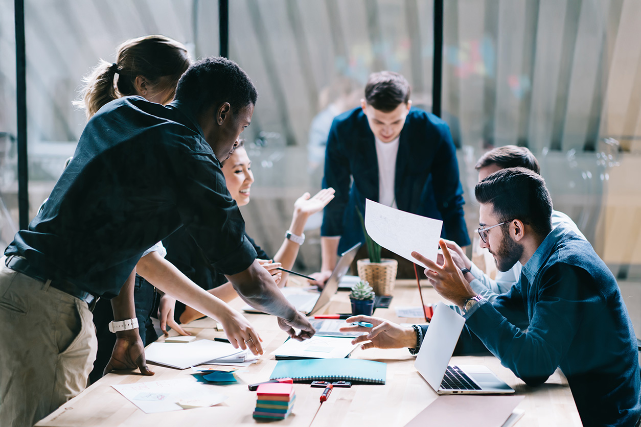 team collaborating in a boardroom