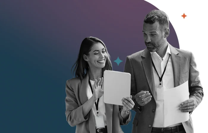 Woman showing a man results on paper dressed in business attire