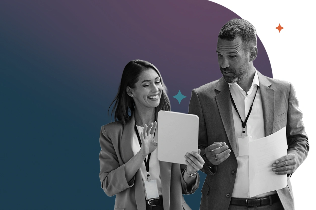 Woman showing a man results on paper dressed in business attire